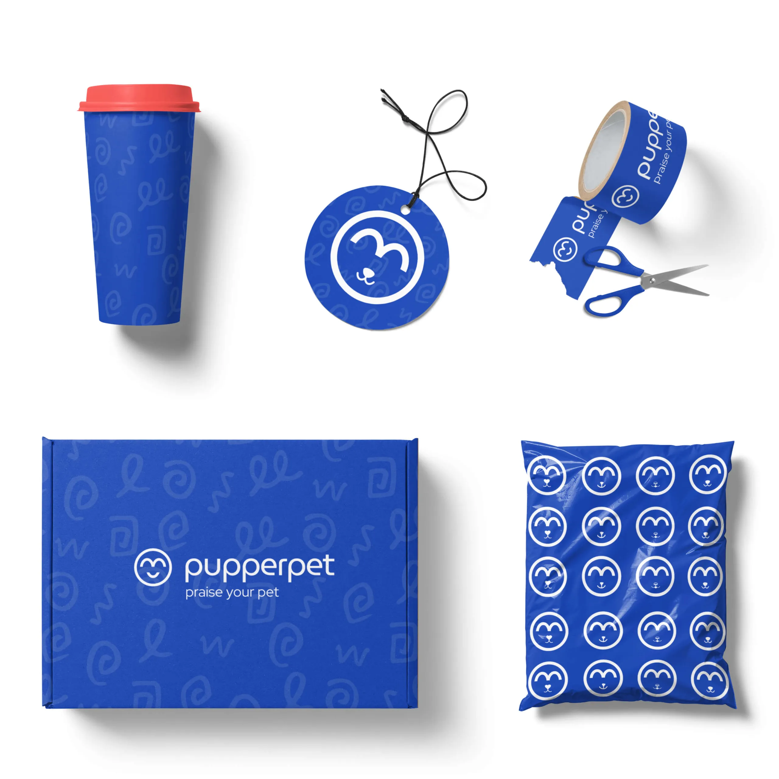 Pupperpet branded packaging: a coffee cup, hang tag, tape roll, shipping box and mailer bag